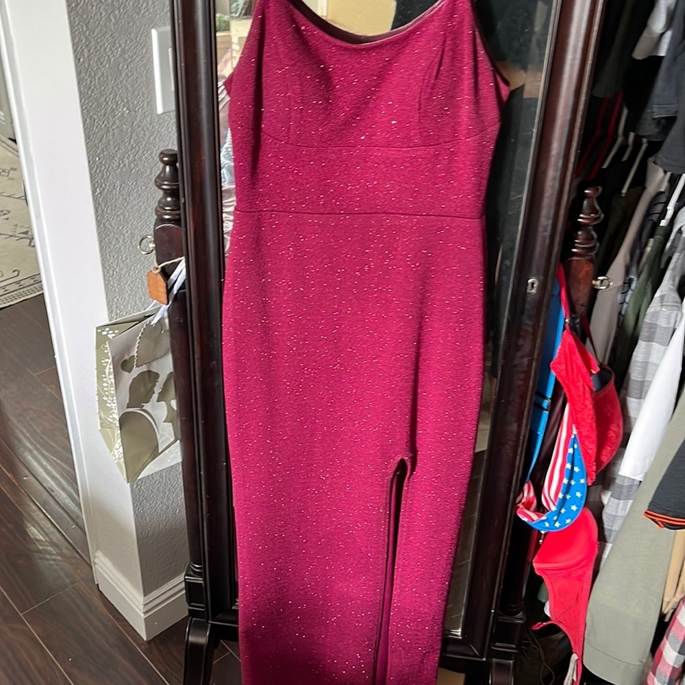 Maroon sparkle long dress with slit. Tie up and zip up back.